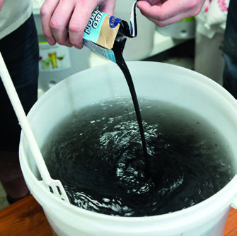 Liquid activated carbon added