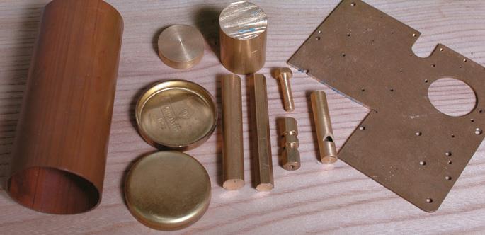 The boiler tube (left) beside end Welch plugs.