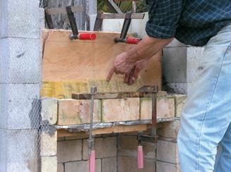 Wet paper as release agent allows the form to be pulled out when the concrete has set