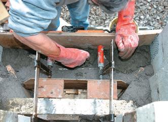 Ordinary cement against front ply (top) and refractory concrete against the curved form (bottom)