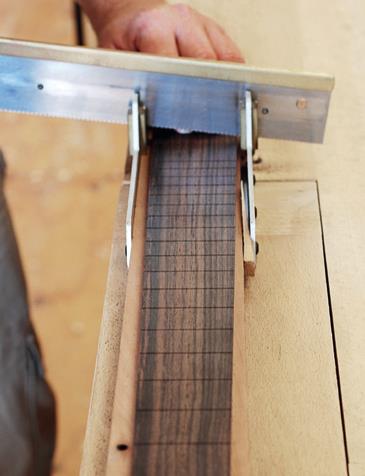 Mitre box and fret saw cutting frets