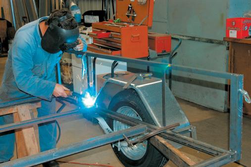 Tack weld uprights.