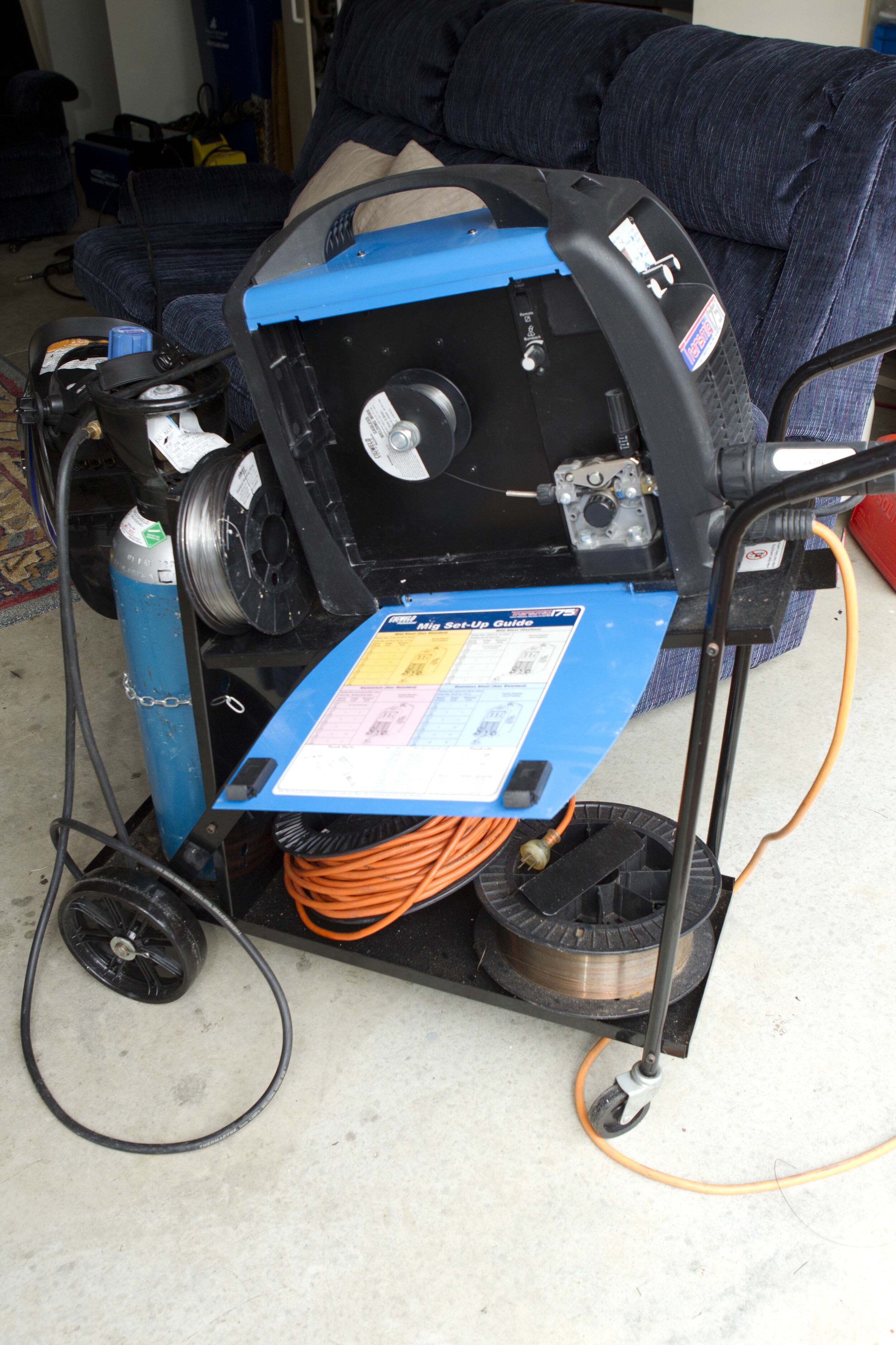 Leaving cover open invites dust and dirt to contaminate wire-feed