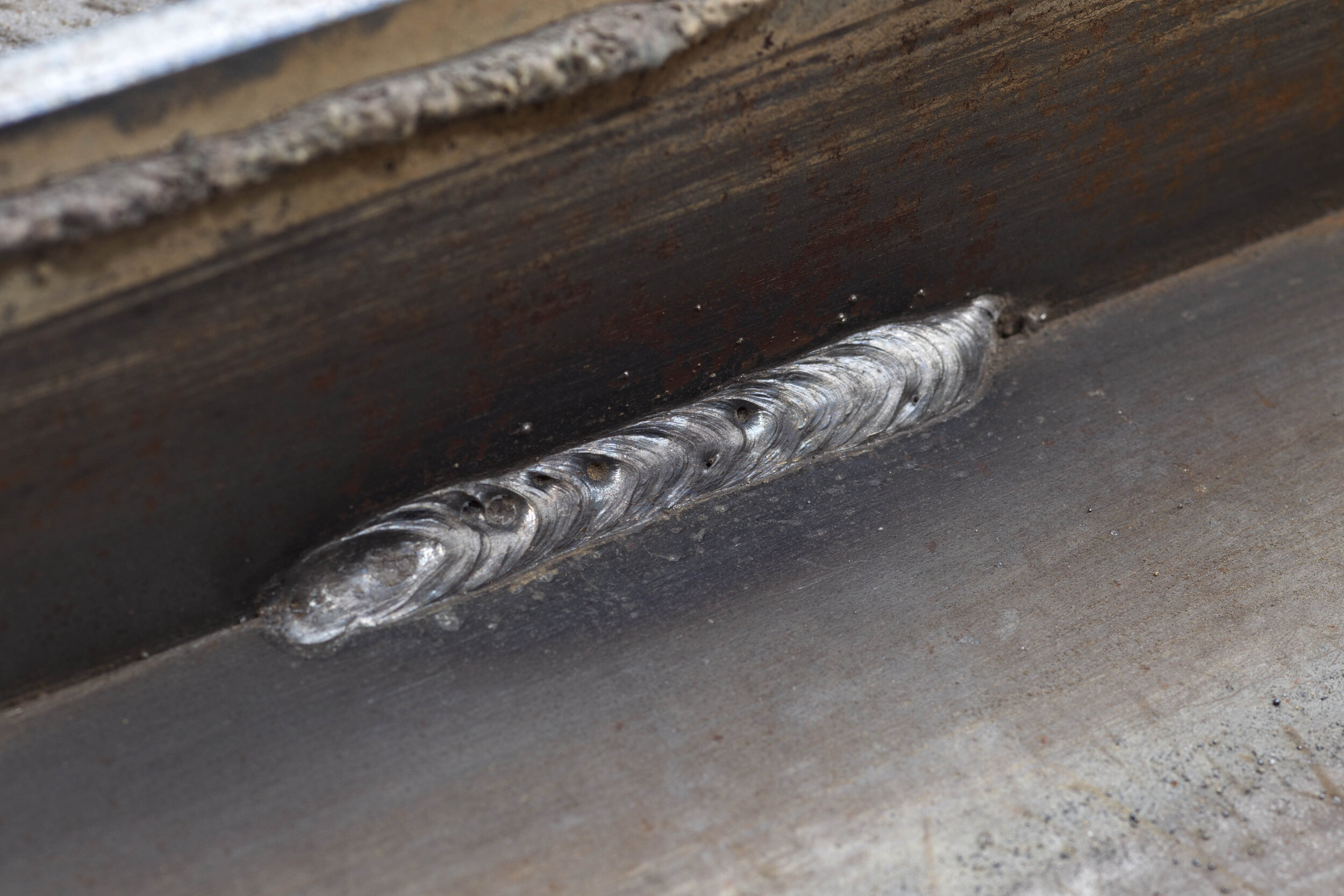 Too high voltage is a common cause of porosity