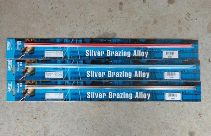 Pink, blue and uncoated brazing alloys. Colours indicate different silver percentages