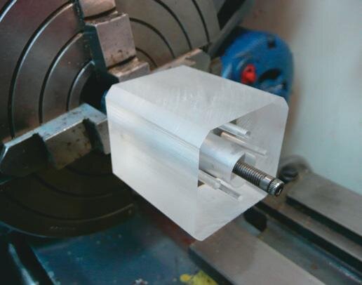 Clear cylinder block mounted on mandrel