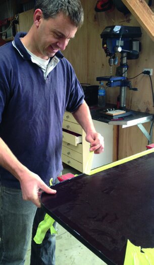 Tape holds PVC edging while glue dries