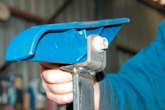 Skid bolted to trailer hanger