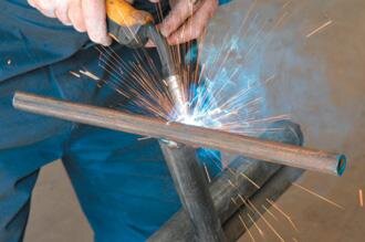 Tack welding the handle