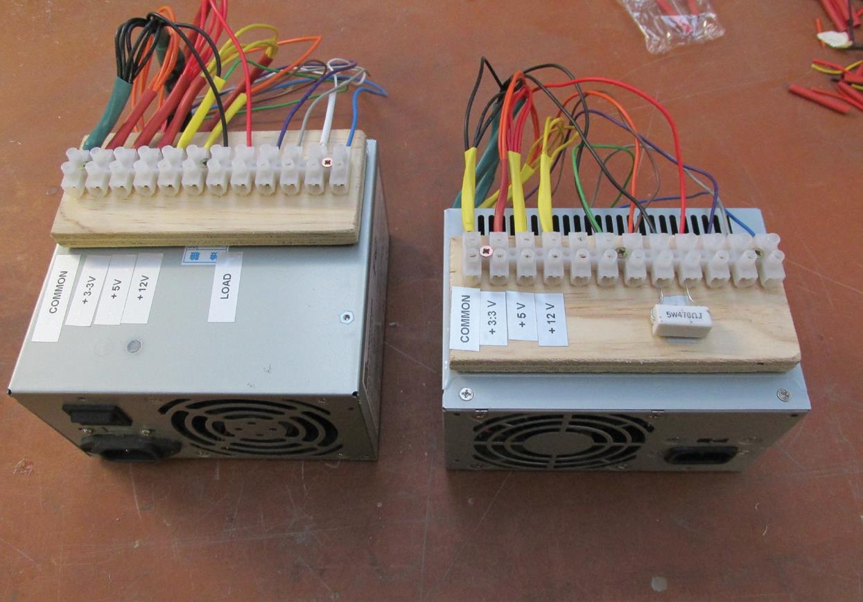 Ex-computer power reworked into two little DC power supplies, 300 watt (left) and 90 watt.