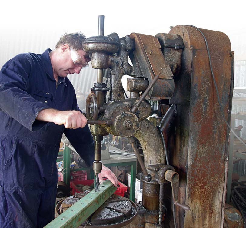 Drilling locking pin holes at 100mm centres on sliding stanchion