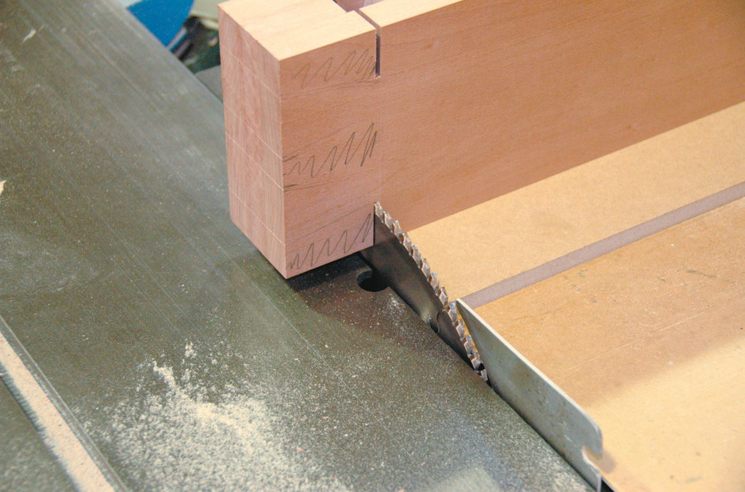 Using circular saw to cut shoulders of dovetails