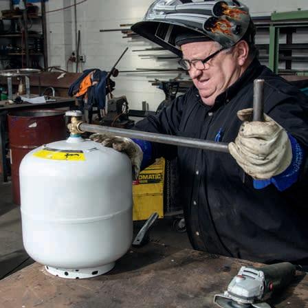 Unscrewing the valve.