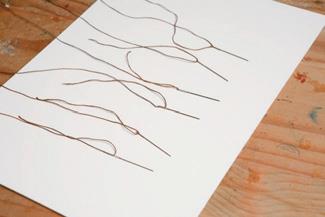 Two needles on each thread