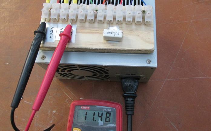 Testing 90 watt power supply—not quite enough power to operate the headlamp bulb. At 11.48v this is quite close to the minimum voltage (11.40v).