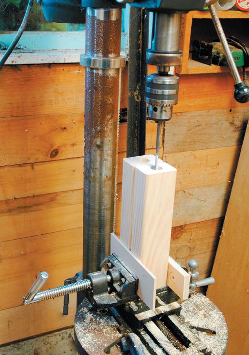 Set up for boring dowel hole in uprights.