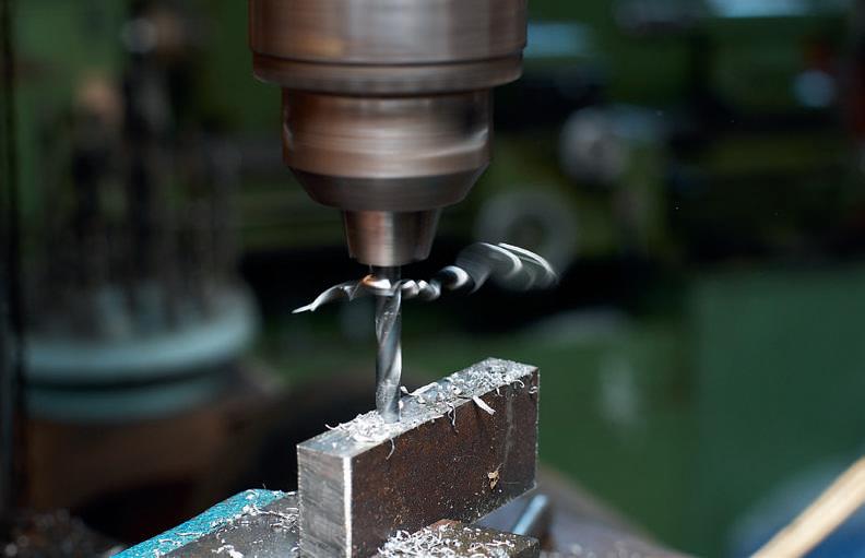 Drilling the screw holes in the support block