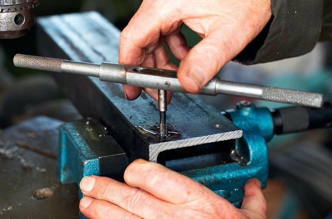 Drilling and tapping the holes for the support bar mounting to the lower form bar.