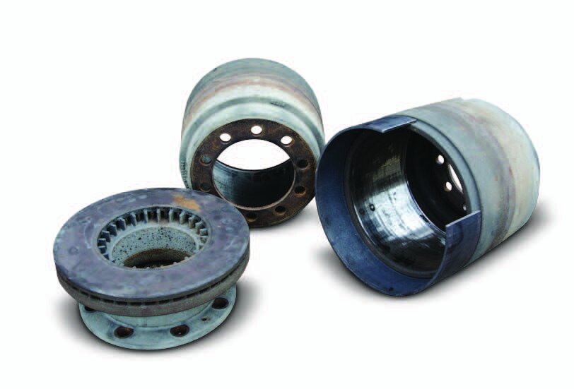 The parts: two brake drums and a disc brake with a rolled mild steel collar