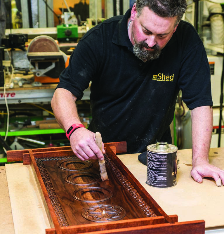 Finishing touches: applying the Danish oil