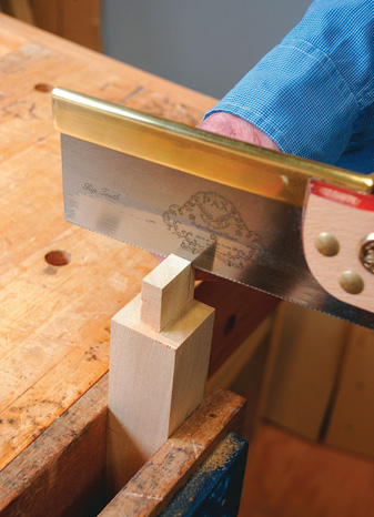 Trimming the side of the tenons by hand
