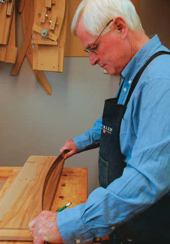 A ruler or thin strip of MDF makes an even curve to draw around