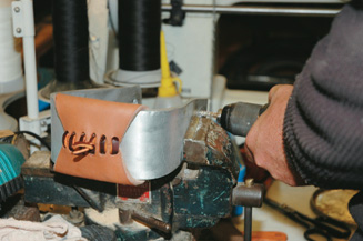 Drilling holes in stirrups