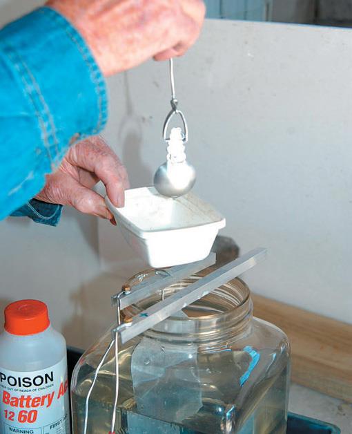 Use drip tray when lifting anodised spoon from acid.