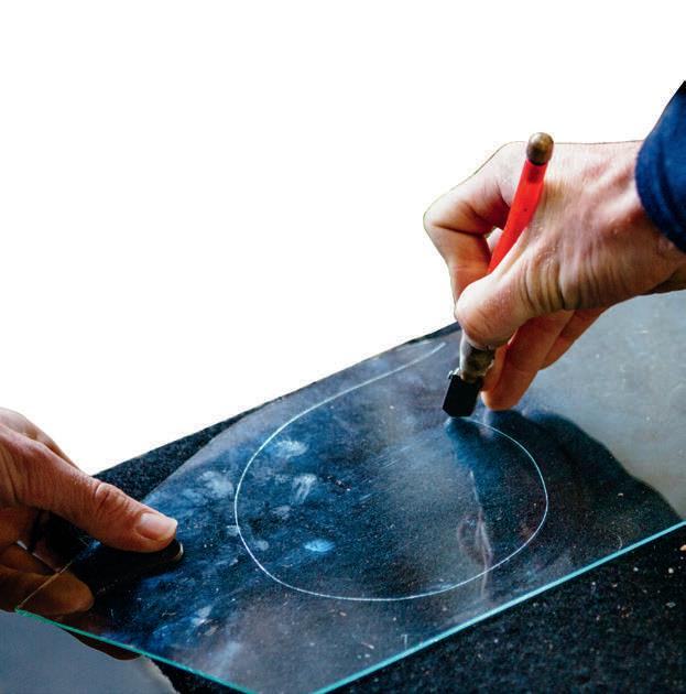 Starting to cut a circle freehand.