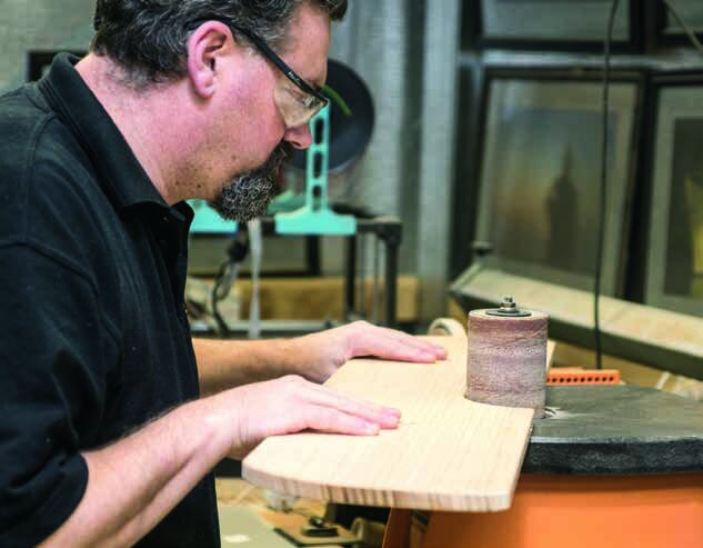 Smoothing the wing profile on the disc sander…