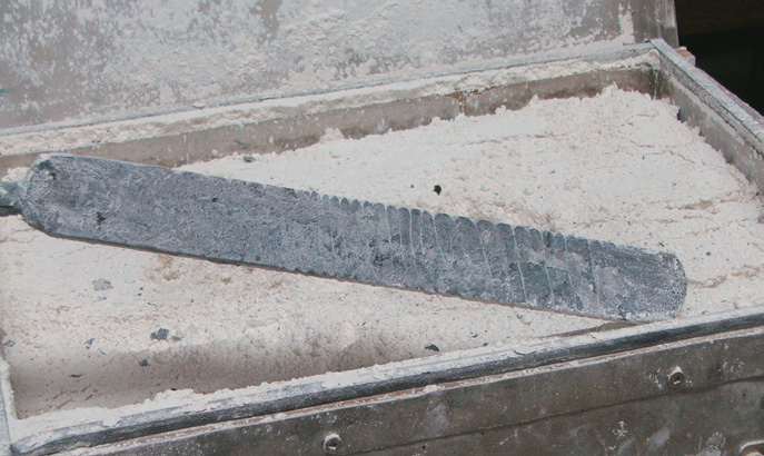 Bar annealing in wood ash