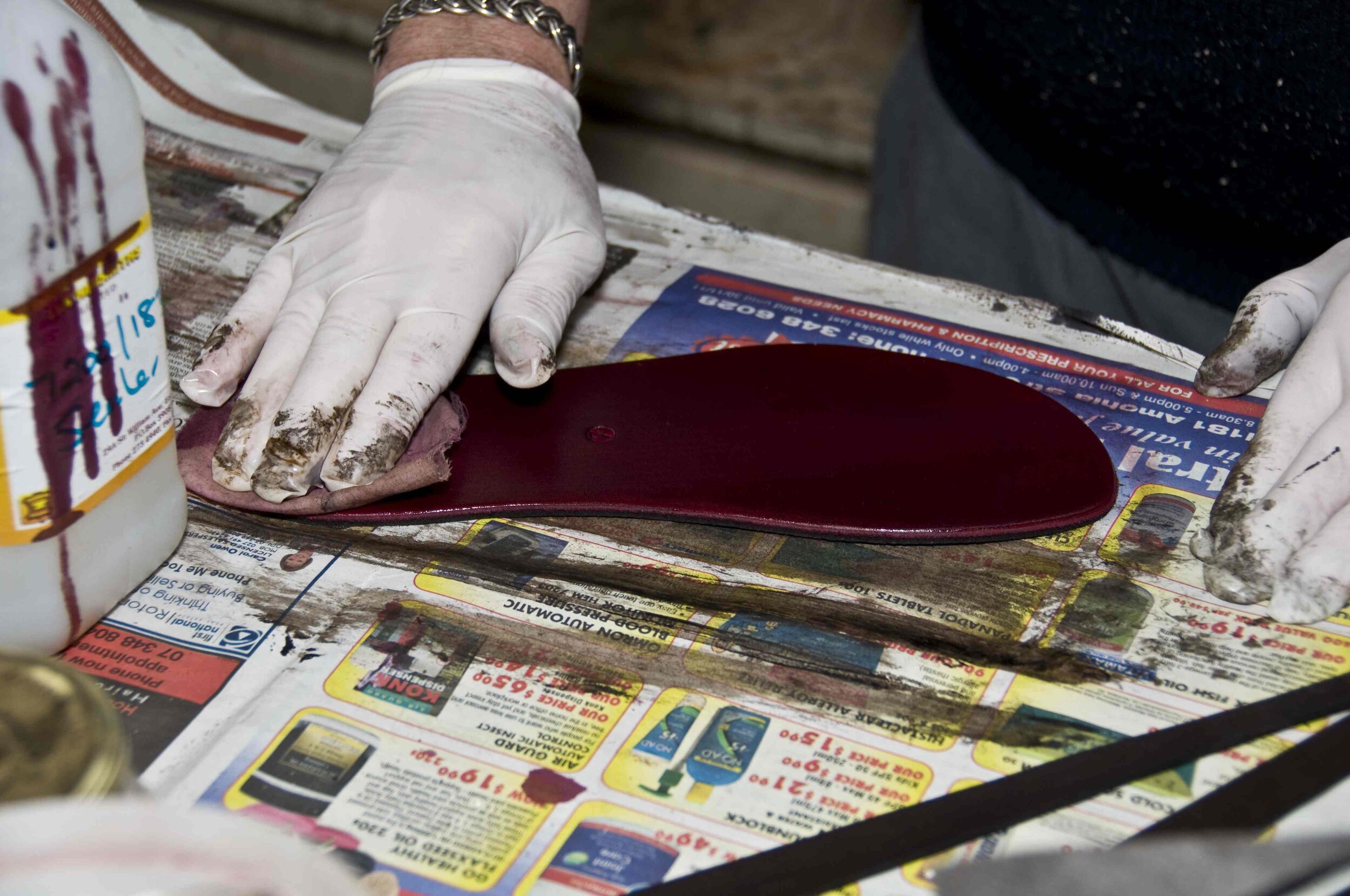 Applying the acrylic sealer.