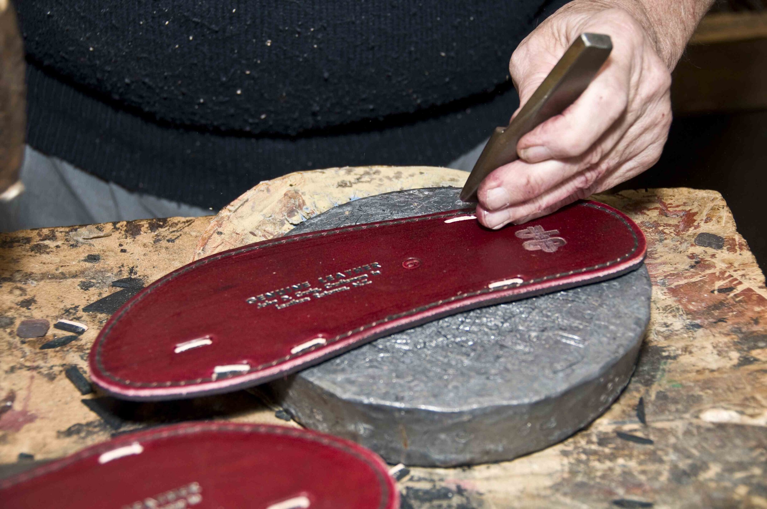 Punching the slots for the straps