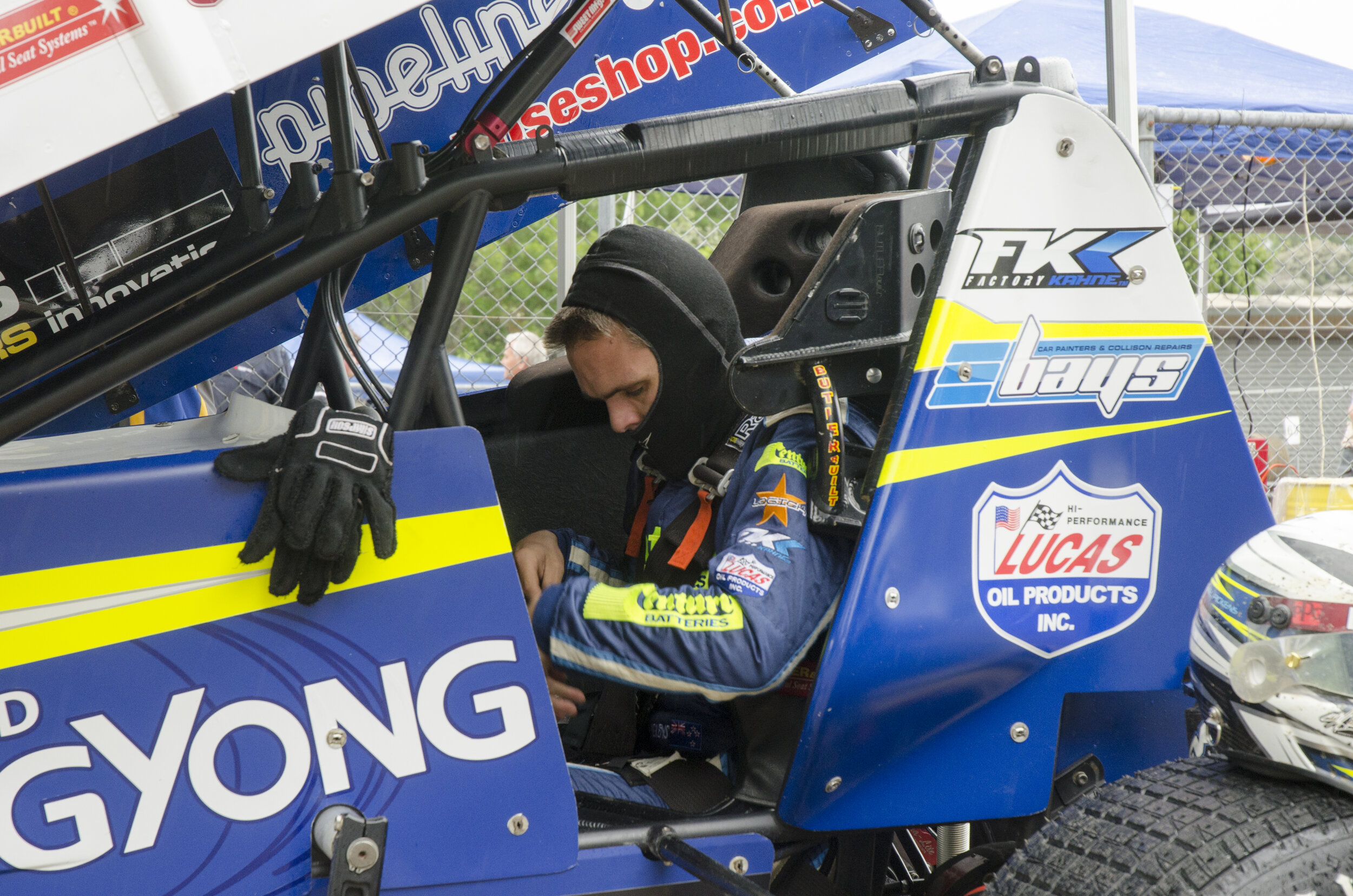 Michael Pickens, Midget champion for 2014, kits up in his sprint car