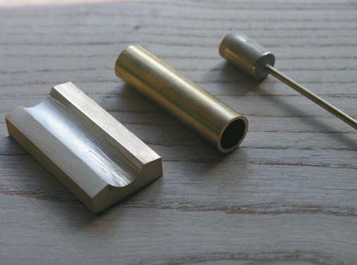 Saddle, cylinder and piston.