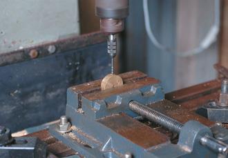 Drill crank wheel for grub screw.