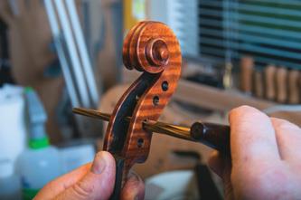 Peg holes are reamed out.