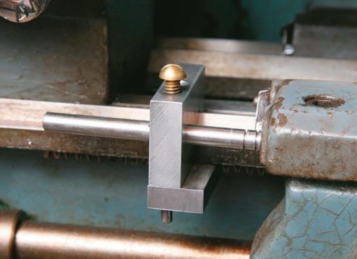 Lathe stop ﬁxed on.