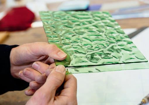 Snapping the glass by hand.