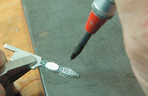 Centre-punch pop the dots.