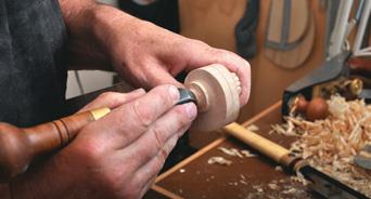 Reﬁning the cut, careful not to undercut.