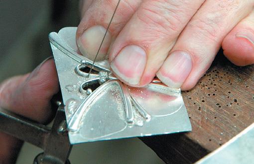 Cut away silver sheet.