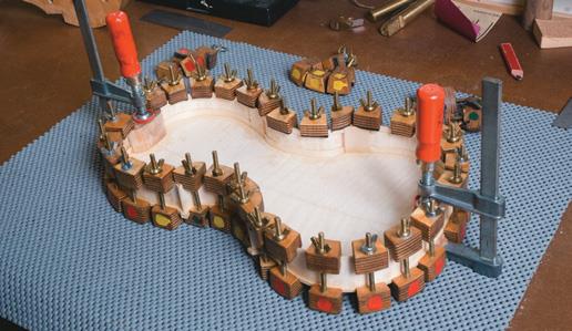 Back glued and clamped ﬁrst.