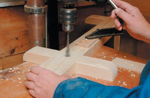 Boring the dowel hole in the base.