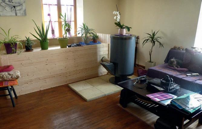 A Rocket Stove spaceheater installed.