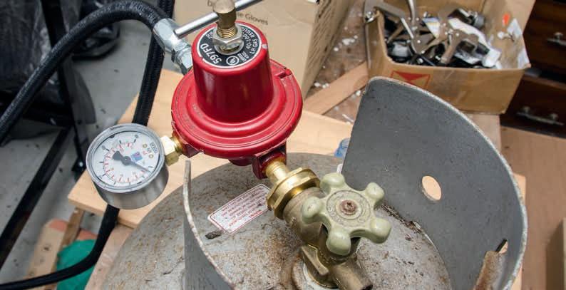 The pressure valve with gauge.