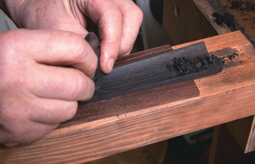 Scraping inside of ﬁngerboard.