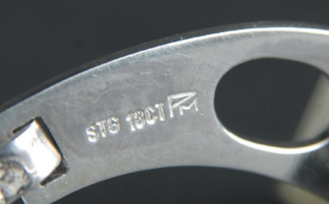 Maker's mark and carat alloy stamp