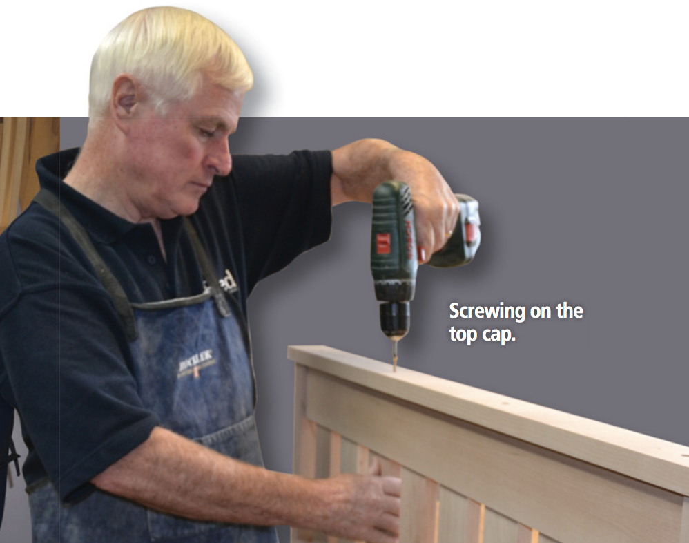 Screwing on the top cap.