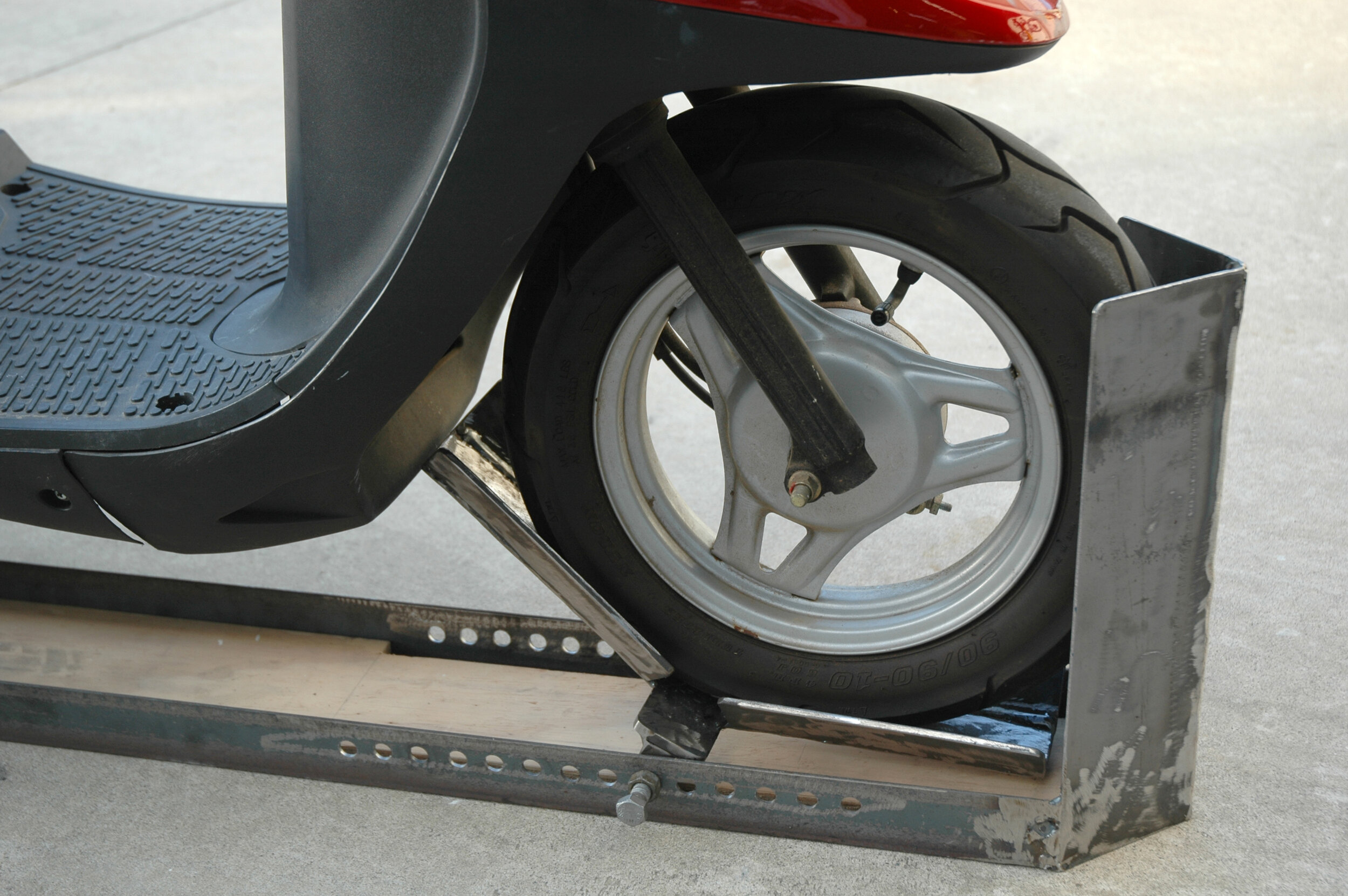 Scooter wheel locked in place